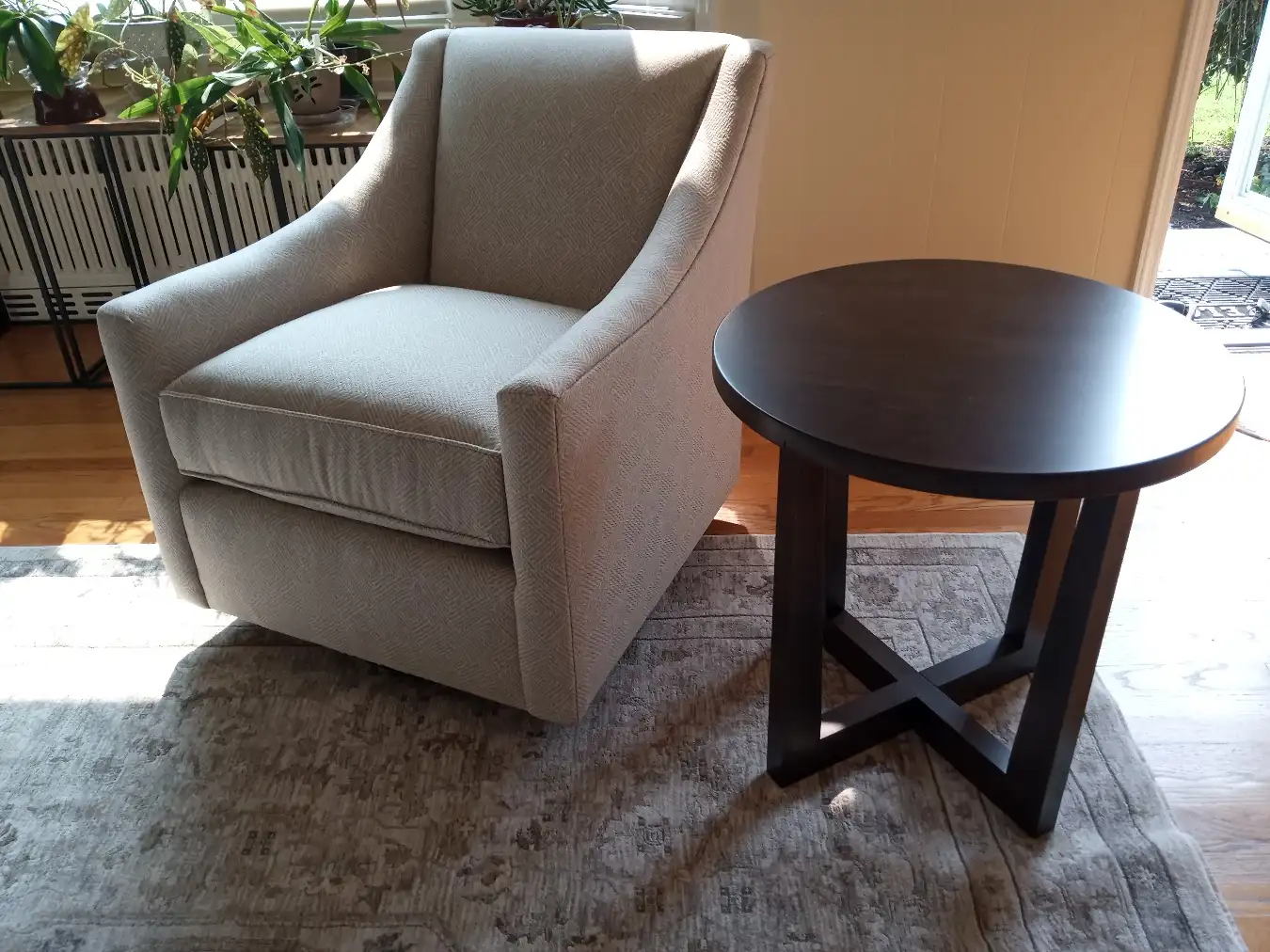 Chair and side table inside a customer’s home set up by RF Delivery